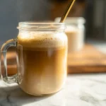 creamy hot protein coffee recipe in glass mug